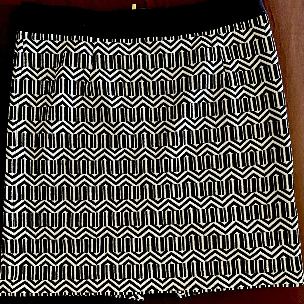 Beautiful black and white skirt. Size 8, spandex material, and comfortable.